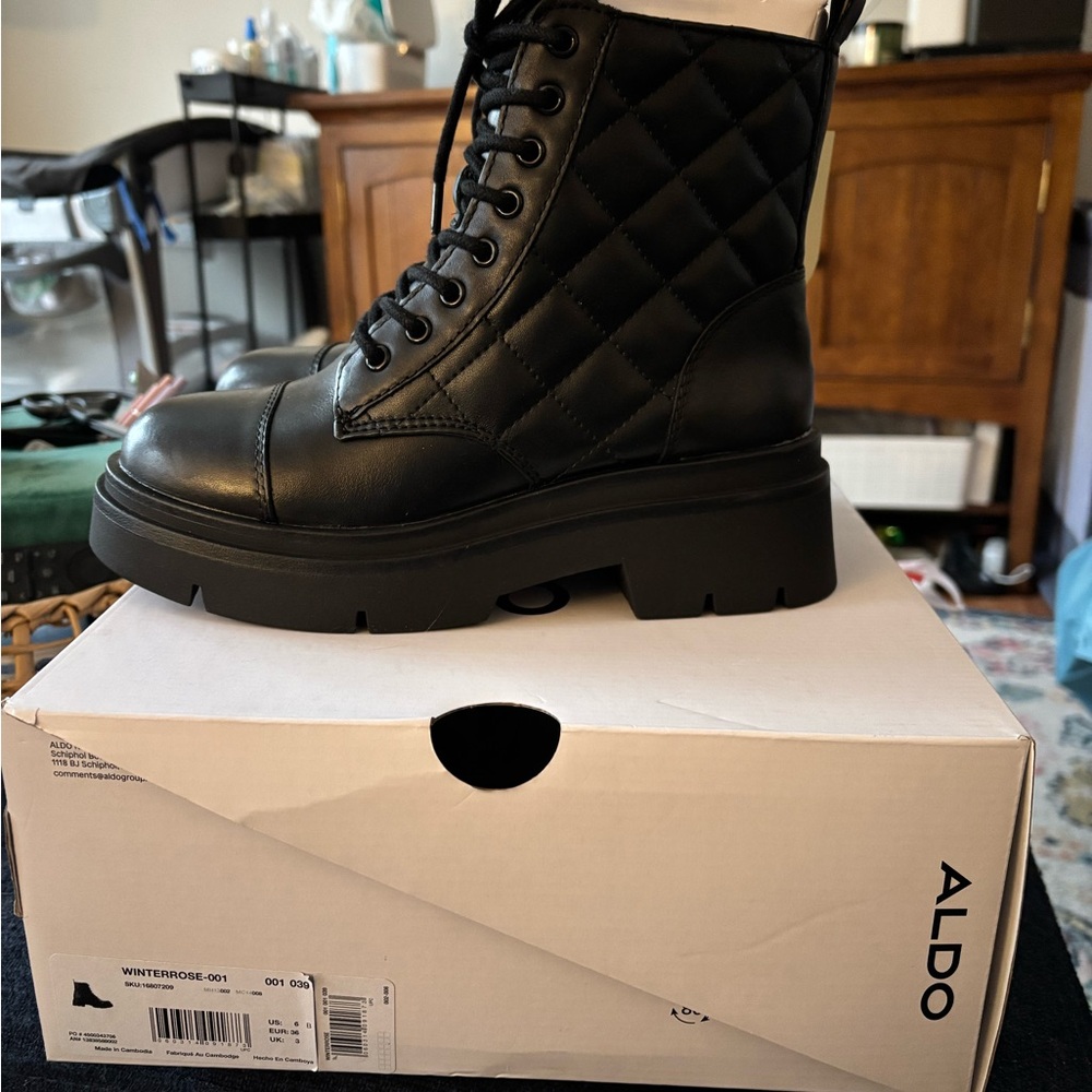 NIB never worn Aldo Winterrose black combat boots. Women’s size 6